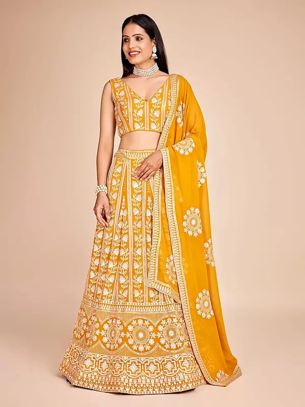 Traditional Lehenga Crafted With Artistic Thread And Sequin Embroidery On Smooth Faux Georgette Fabric