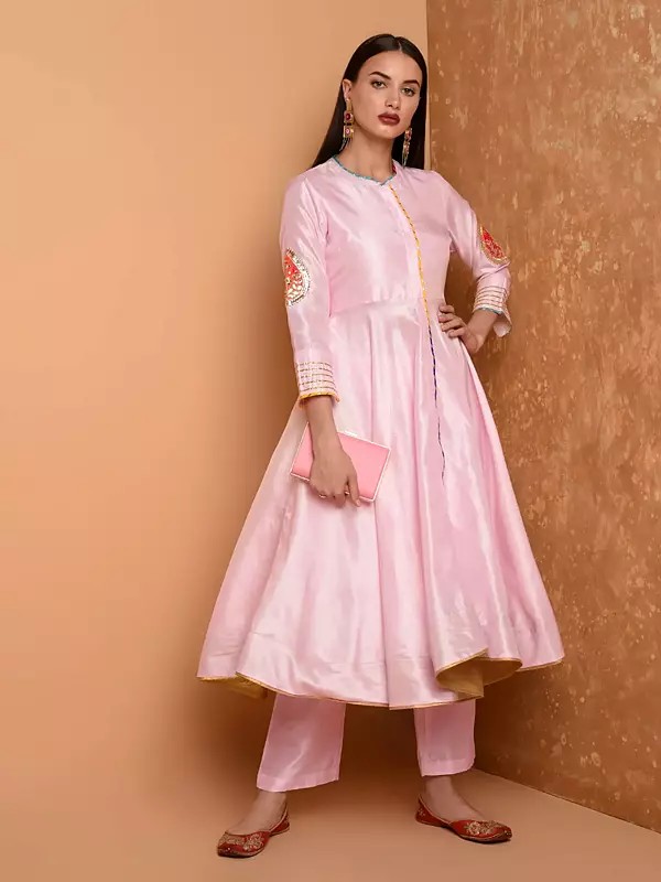 Silk Flared Kurta Set With Exquisite Patch Work On Sleeves And A Flattering Silhouette Paired With Matching Trousers For Evening Parties
