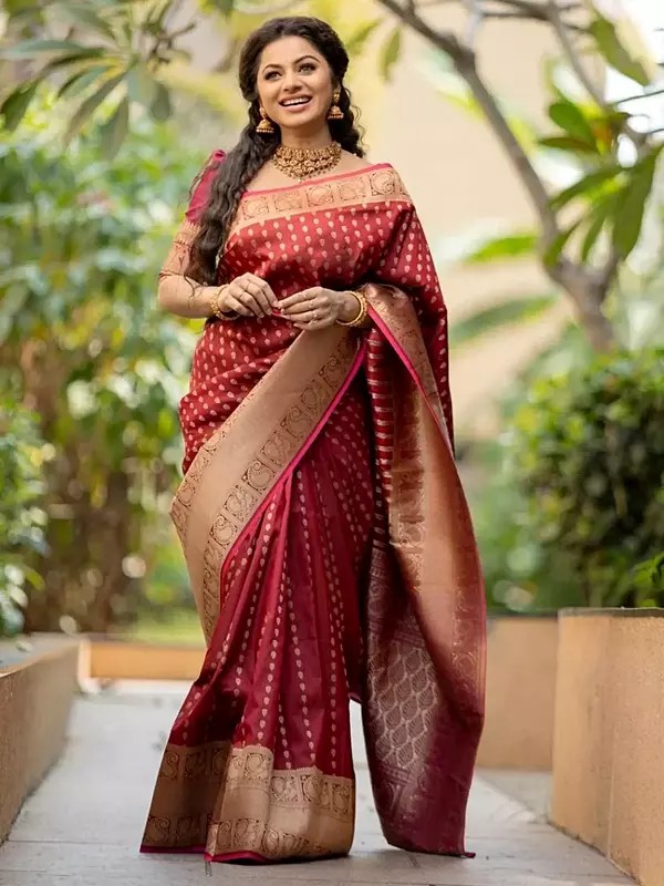 Elegant Soft Lichi Silk Saree Featuring Detailed Jacquard Patterns And A Beautifully Finished Rich Pallu Ideal For Reception Wear