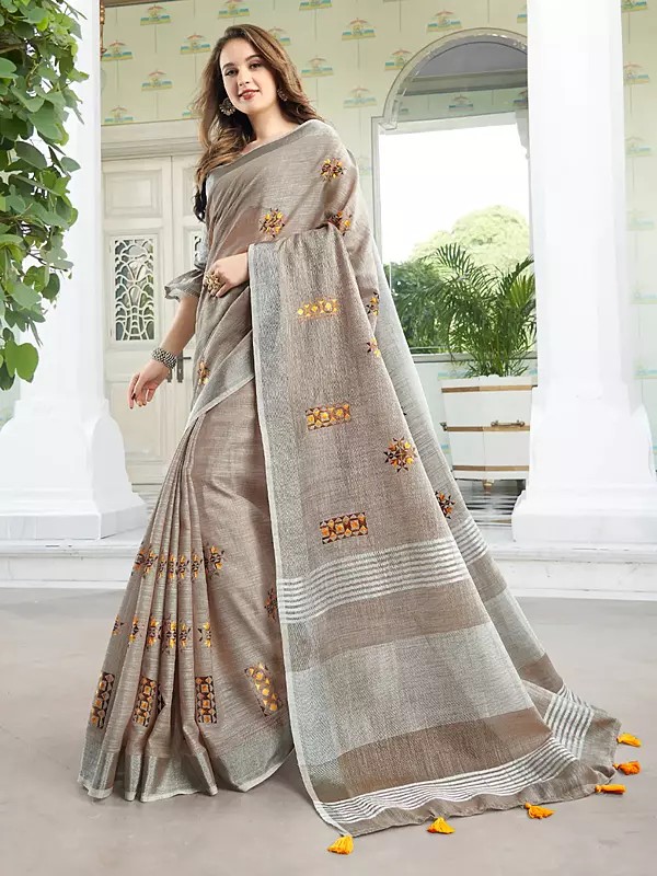 Linen Saree With Soft Breathable Drape Subtle Texture And Delicate Floral Embroidered Motifs For Everyday Festive Wear