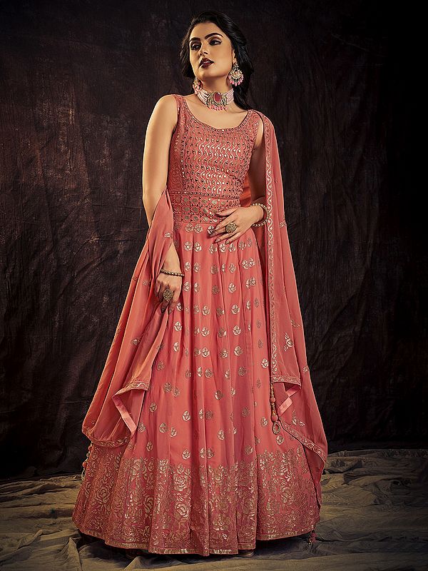 Coral Georgette Floral Butti Motif Anarkali Style Gown With Sequins Embroidery And Tassel Dupatta