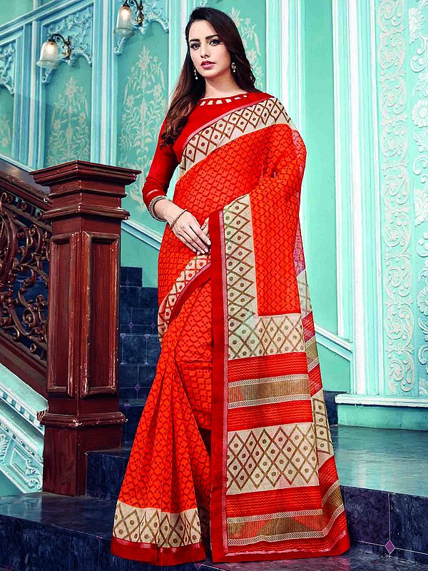 Crafted to perfection, this saree embodies the essence of tradition with its vibrant orange hue and mesmerizing Patola prints, a hallmark of Gujarati artistry. The renowned weaving technique known as Patola print has been around for more than 700 years; t
