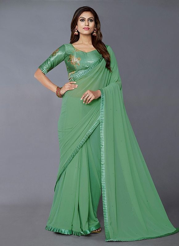 Pista-Green Georgette Saree With Sequins Work On Body And Lace Work On Border