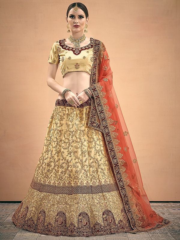 Golden Satin Bridal Lehenga Choli with Over Heavy Dori Embroidery with Stonework and Net Dupatta
