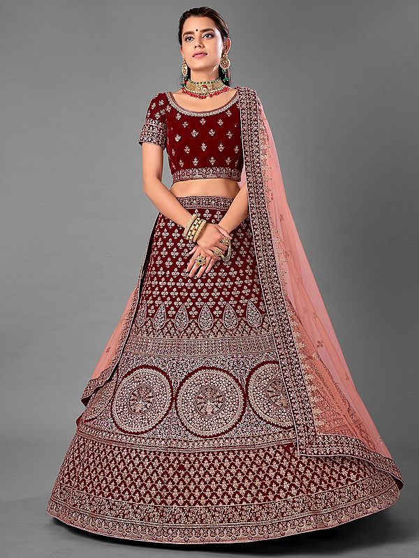 Maroon Velvet Embellished Buti Motif Lehenga Choli With Dori, Zari, Thread Work And Soft Net Dupatta