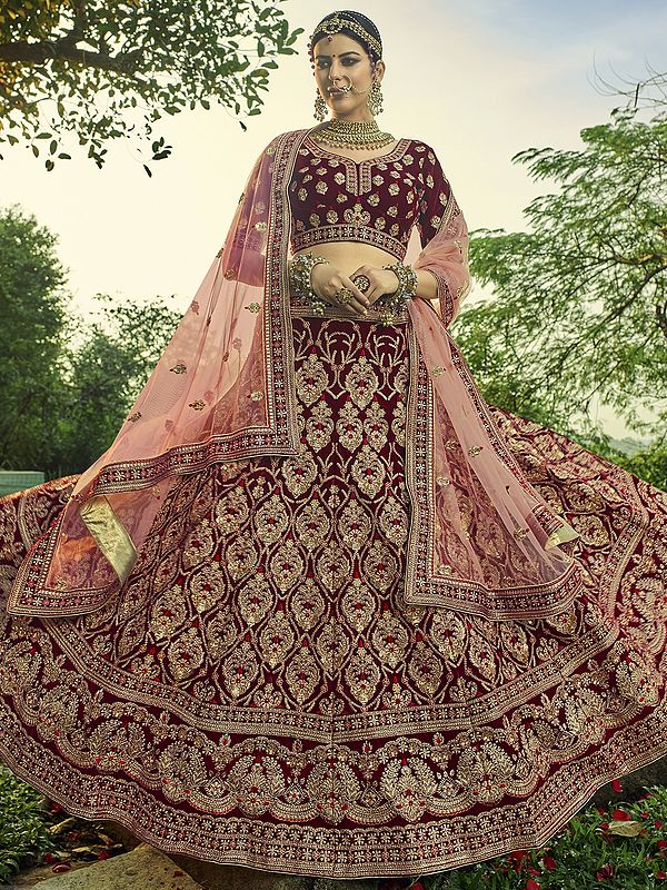 Maroon Velvet Bridal Lehenga Choli with Heavy Zari Topaz Crystals Design and Designer Dupatta