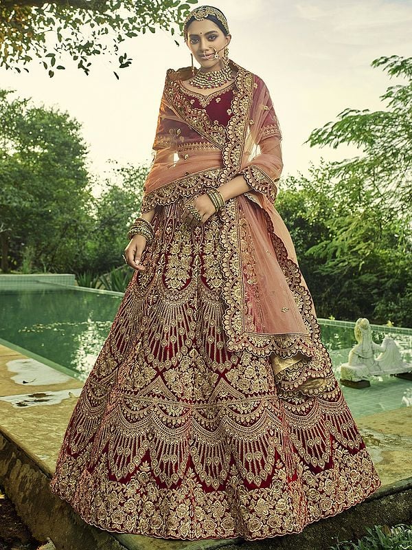 Oxblood-Red Velvet Lehenga Choli With All Over Peacock Feather Design Embroidery and Sequins with Beautiful Dupatta