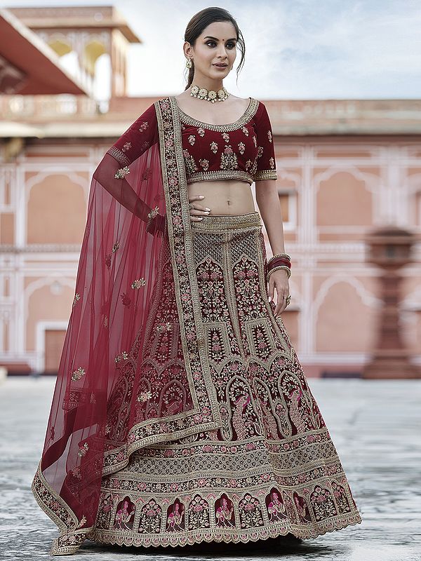 Velvet Bridal A-Line Style Mughal-Peacock Motif Lehenga Choli With Resham, Zari, Dori, Sequins Work And Soft Net Dupatta