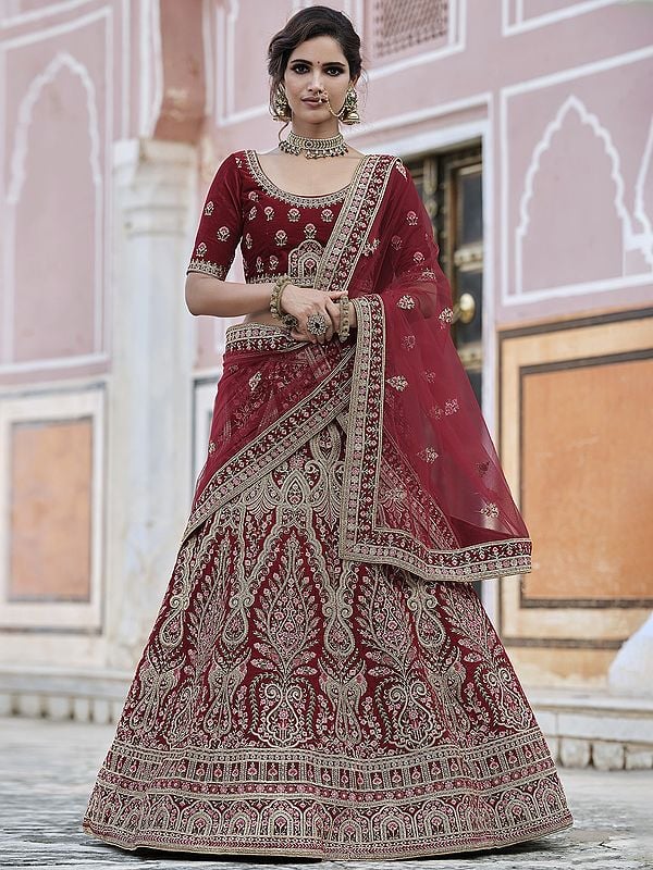 Velvet Bridal Mughal Motif Bridal Lehenga Choli with All-Over Zari work and Soft Net Dupatta