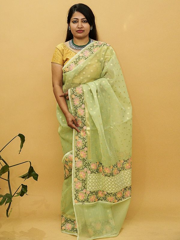 Glass Tissue Banarasi Saree With Butta On The Body And Beautiful Floral Vine Pattern Border